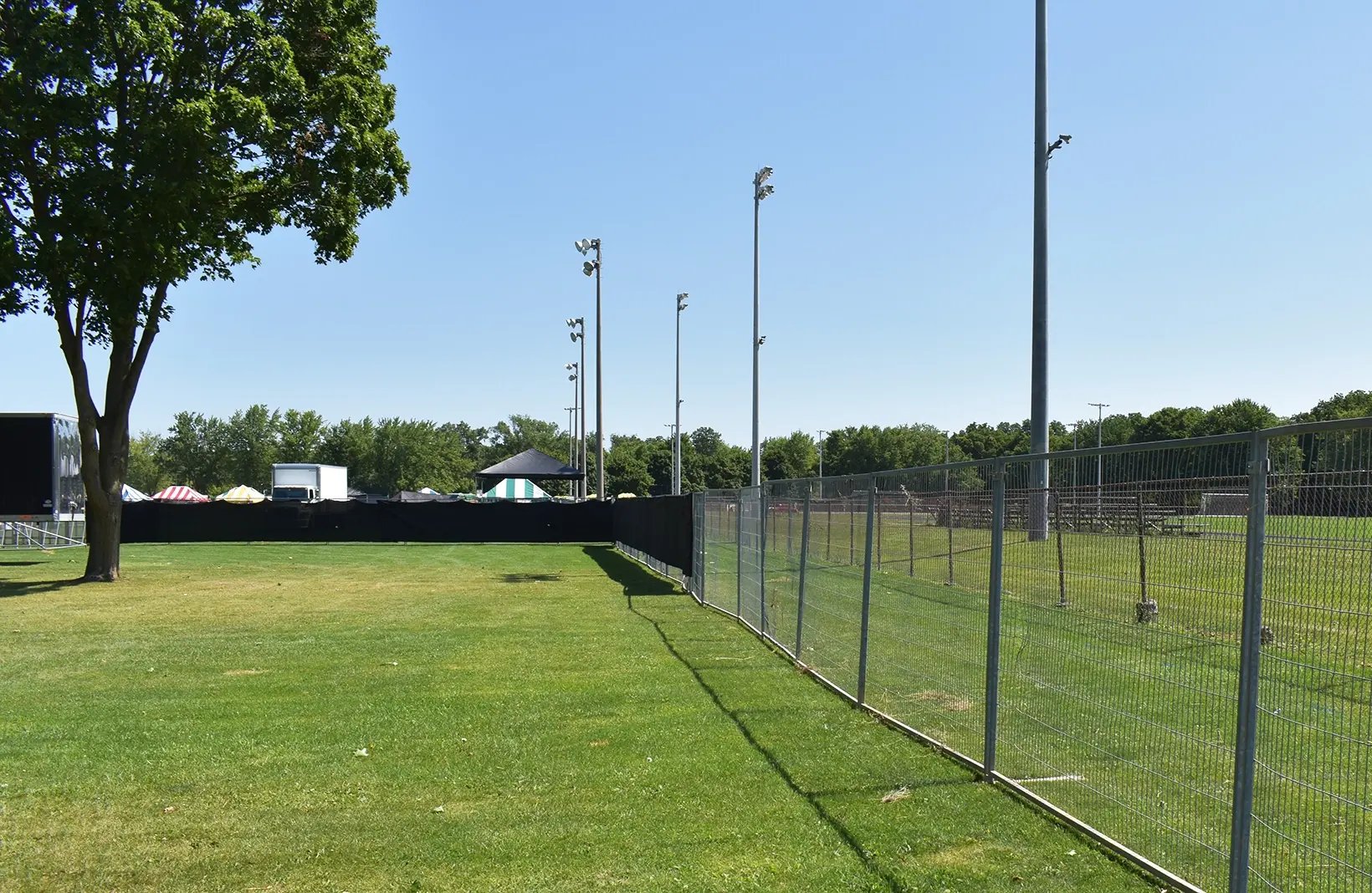 Temporary security fence rental panels providing secure perimeter protection for construction sites, events, and restricted-access areas