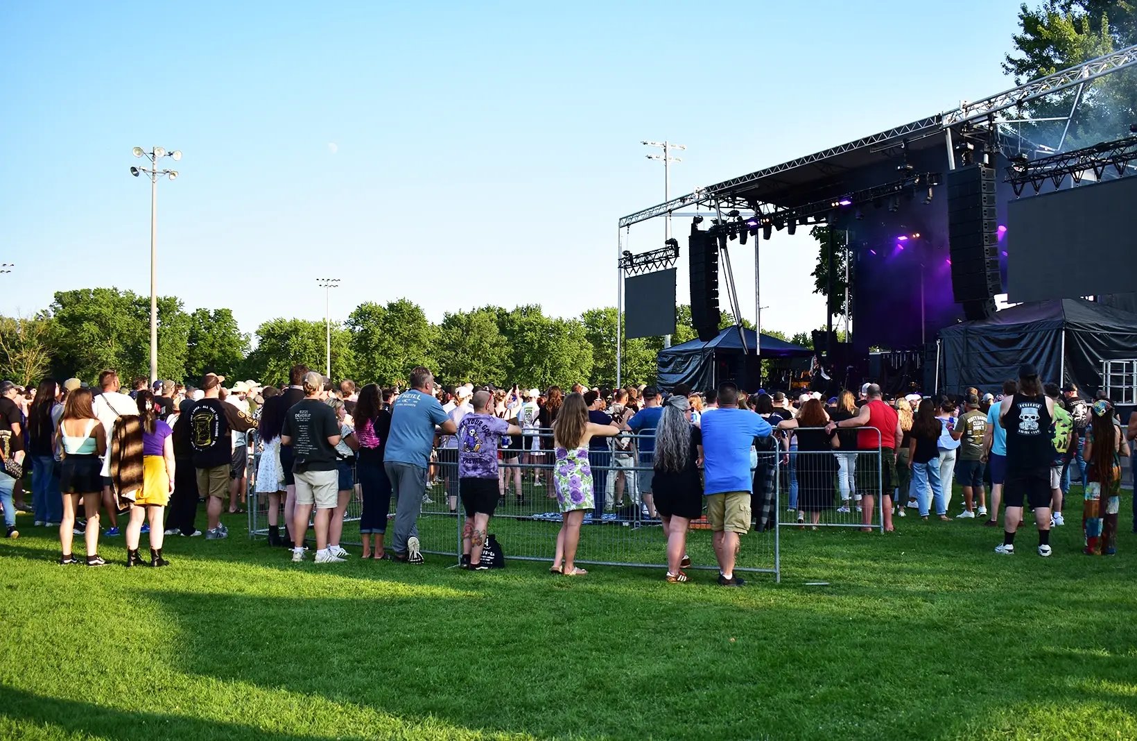 Portable crowd control fencing used to manage pedestrian flow, queue lines, and event perimeters.