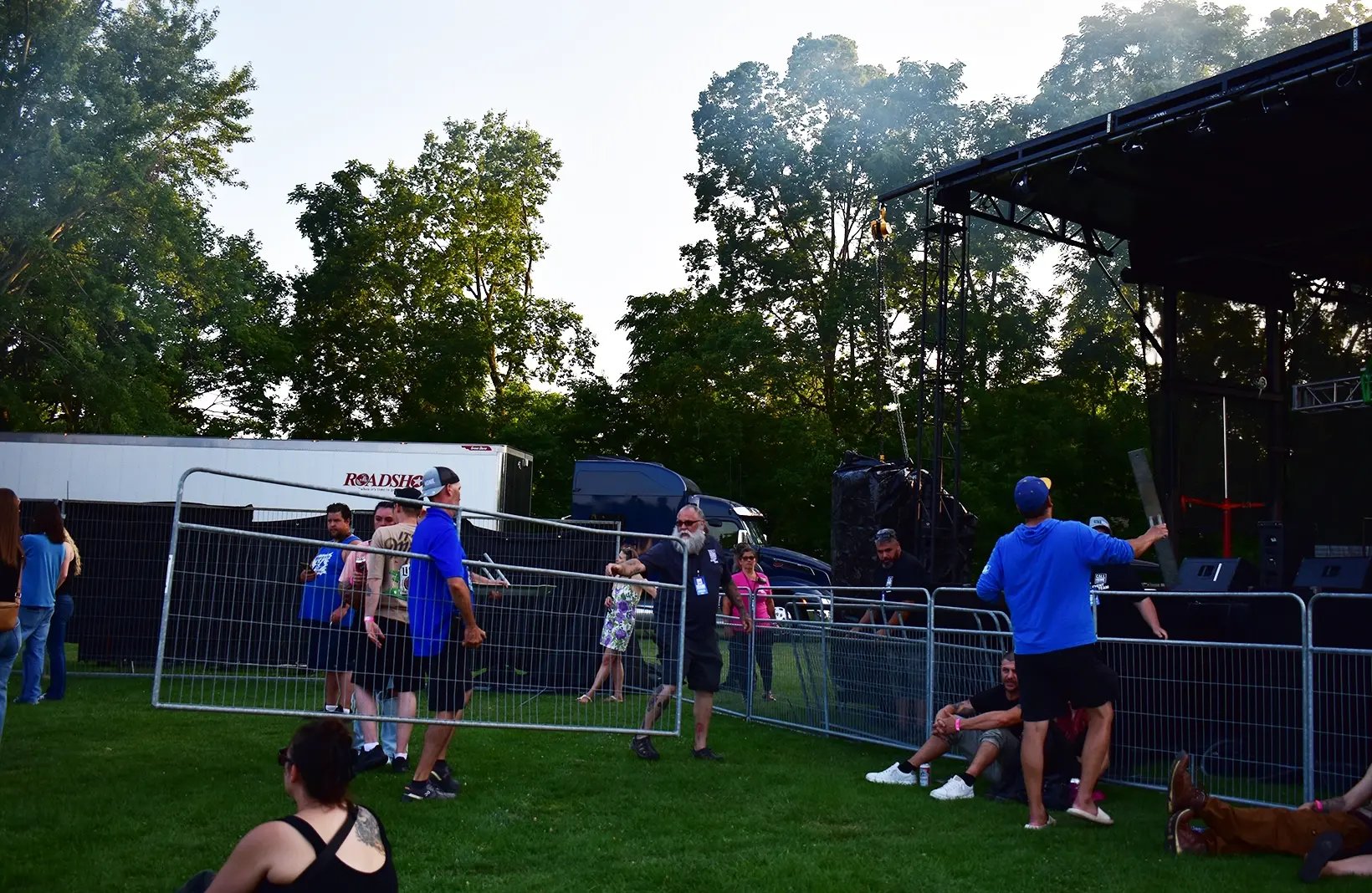 Temporary crowd control barriers creating safe walkways and restricted-access areas for public events