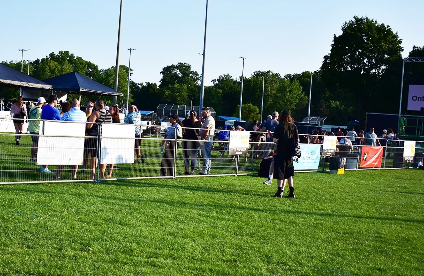 Portable crowd control fencing used to manage pedestrian flow, queue lines, and event perimeters.